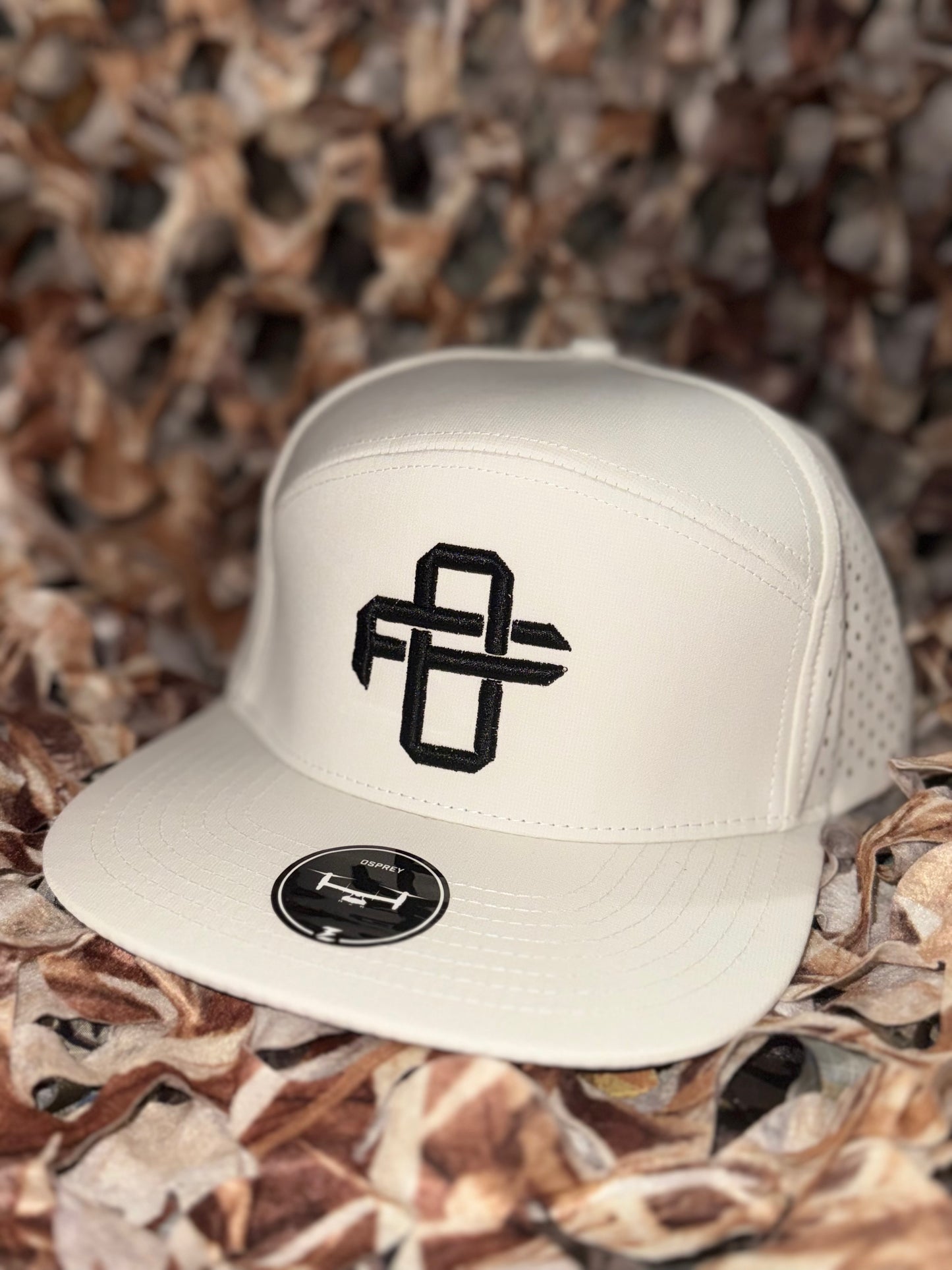 Water resistant white cap with FO logo.