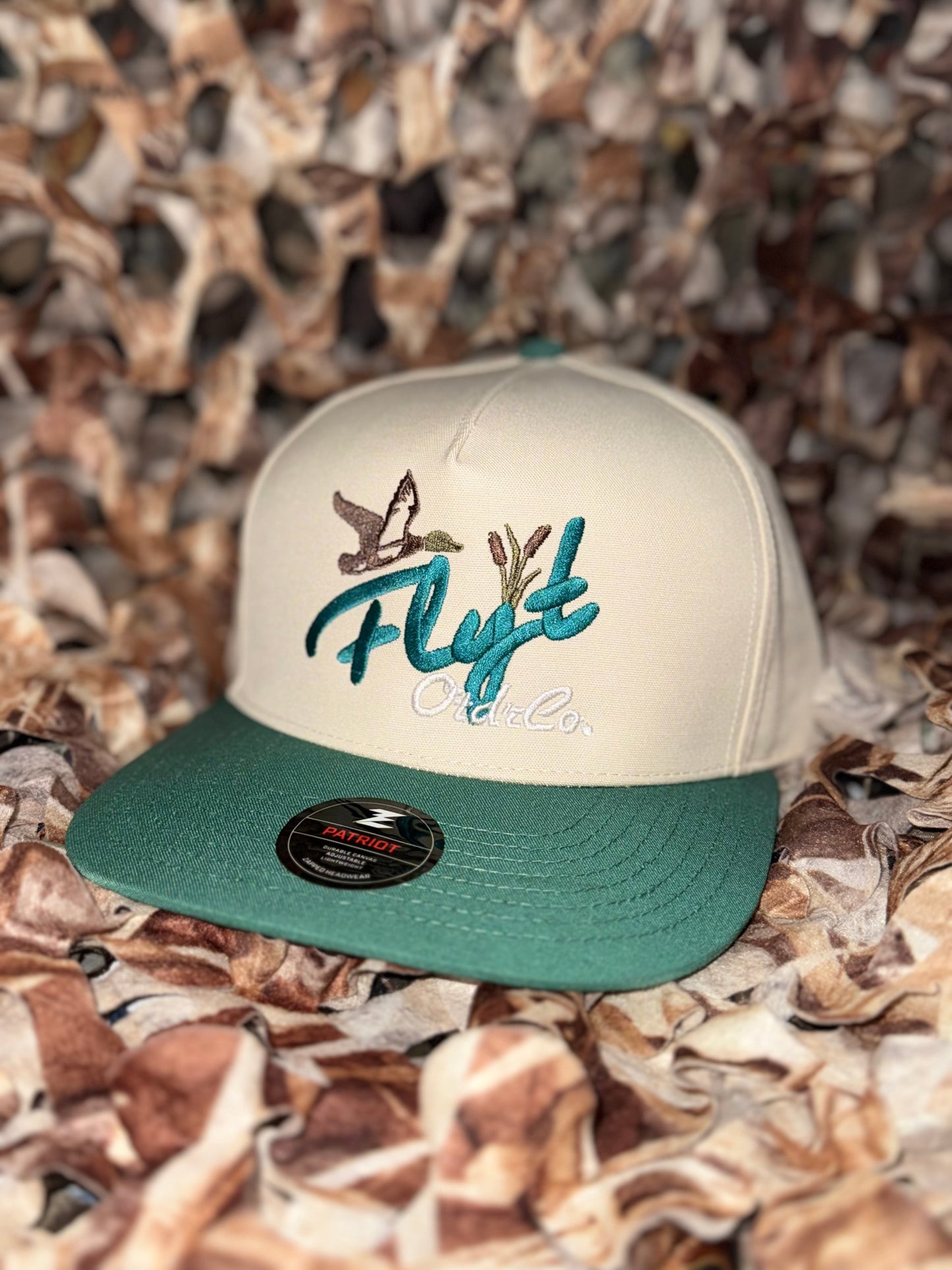 Flyt otdr beige and green cap.